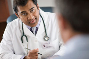 Doctor speaks to patient