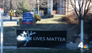 Vandalized sign