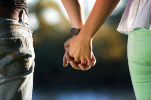 Couple holding hands