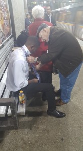 Stranger helps with tie Facebook photo