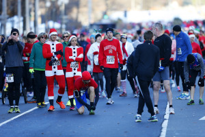 Runners at the 2014 Jingle All the Way street race