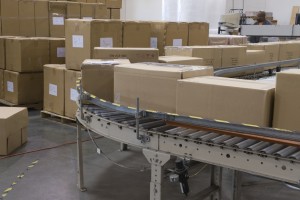 Shipping boxes on conveyor belt