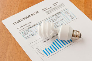 Energy efficient light bulb on top of electric bill