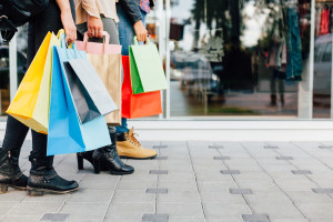 Teens with colorful shopping bags