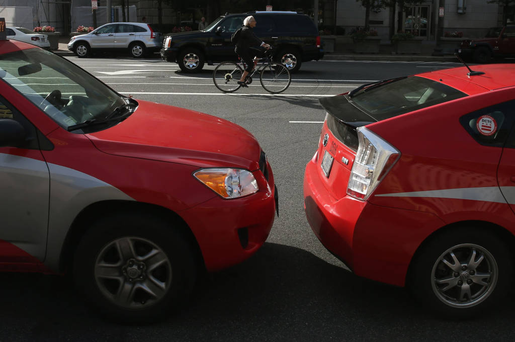 DC Taxi Drivers Rally As City Council Votes On Uber And Lyft Operations