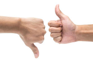 Thumb up and thumb down hand