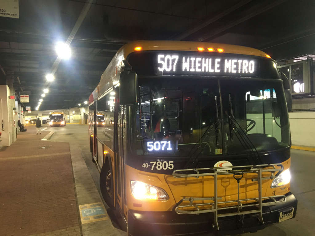 A Fairfax Connector bus at the Wiehle Reston East bus bay. (WTOP/Max Smith)