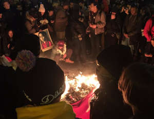 Protesters on K Street on Friday night. (WTOP/Mike Murillo)