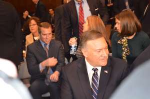 Pompeo amid crush of reporters credit JJ Green