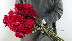 Gentleman with red roses
