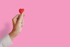 Hand holding heart