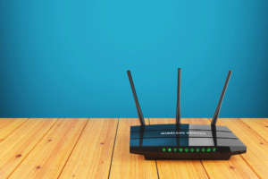 Wi Fi wireless router on wooden table