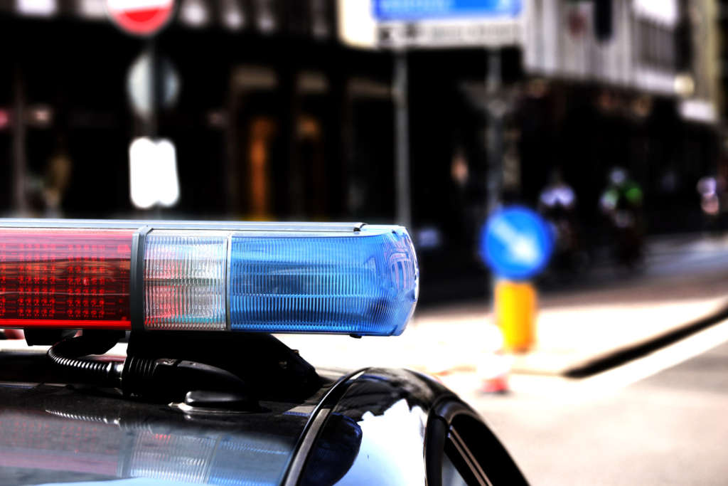 Red and blue flashing lights of the police car