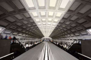 Two Metro trains arrive in a station. (WTOP/Dave Dildine)