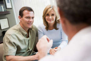 Couple in consultation at IVF clinic (selective focus)