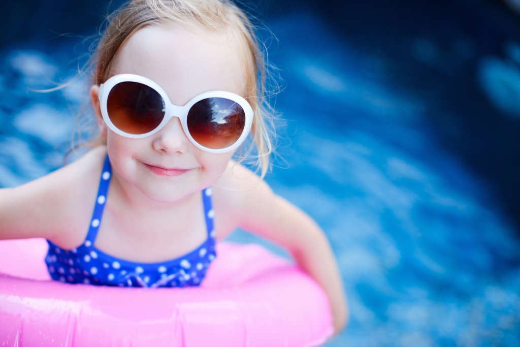 Little girl at swimming pool