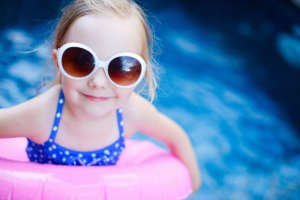 Little girl at swimming pool