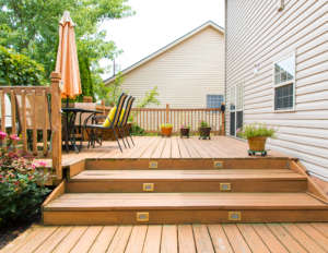 Modern wooden patio and garden area of a family house