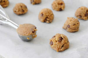 Chocolate chip cookie dough with ice cream scoop