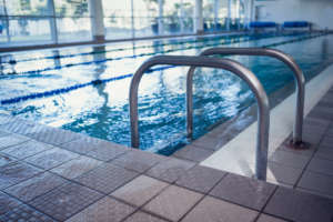 Swimming pool with hand rails at the leisure center