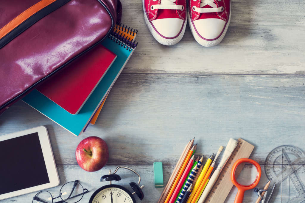 School supplies on wooden background