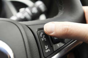 Hand Pressing Car Bluetooth Control On Steering Whee
