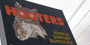 Alice Eve & Krysten Ritter Become "Honorary Hooters Girls"