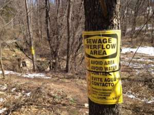 Olney sewage spill sign