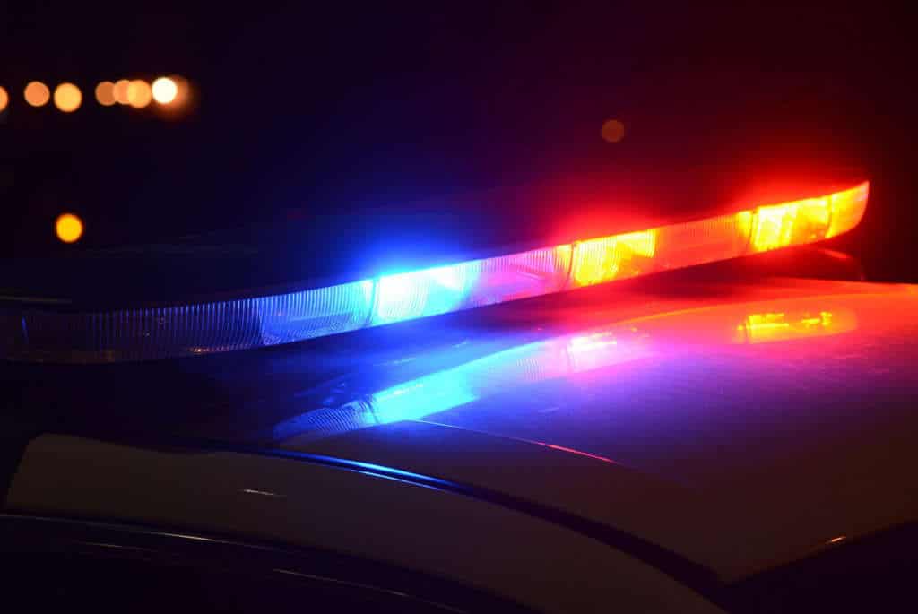 Police light bar atop cruiser.