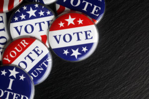 Red, white, and blue vote buttons