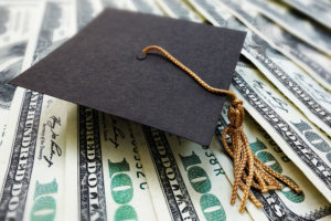 Graduation cap on money