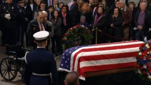Dole Salutes Bush Casket