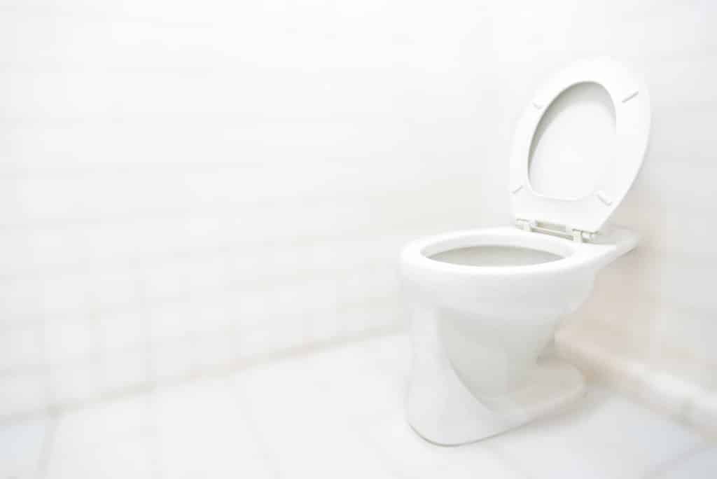 Toilet bathroom or restroom with white clean concept background with copy space, diarrhea, constipation, hemorrhoids, excretory system concept, toilet is the necessary place for excretion.