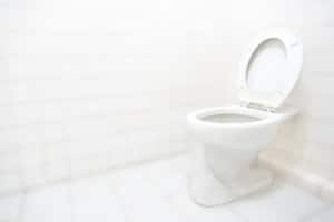 Toilet bathroom or restroom with white clean concept background with copy space, diarrhea, constipation, hemorrhoids, excretory system concept, toilet is the necessary place for excretion.