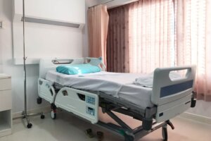 Empty hospital bed for patient