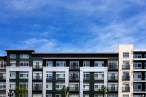 Modern apartment buildings on a sunny day with a blue sky