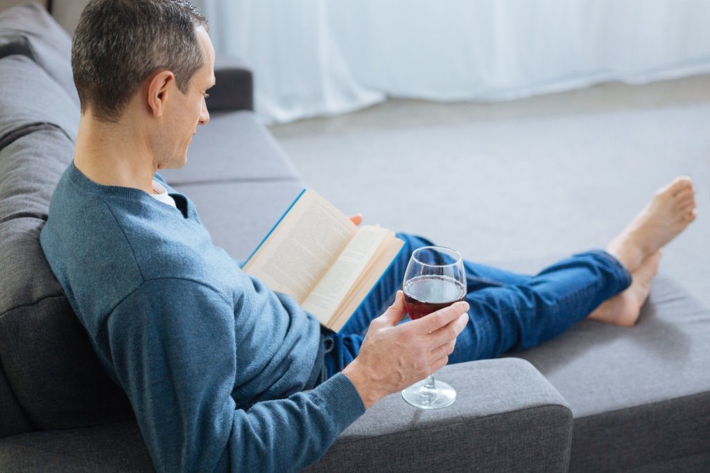 Calm man reading his book