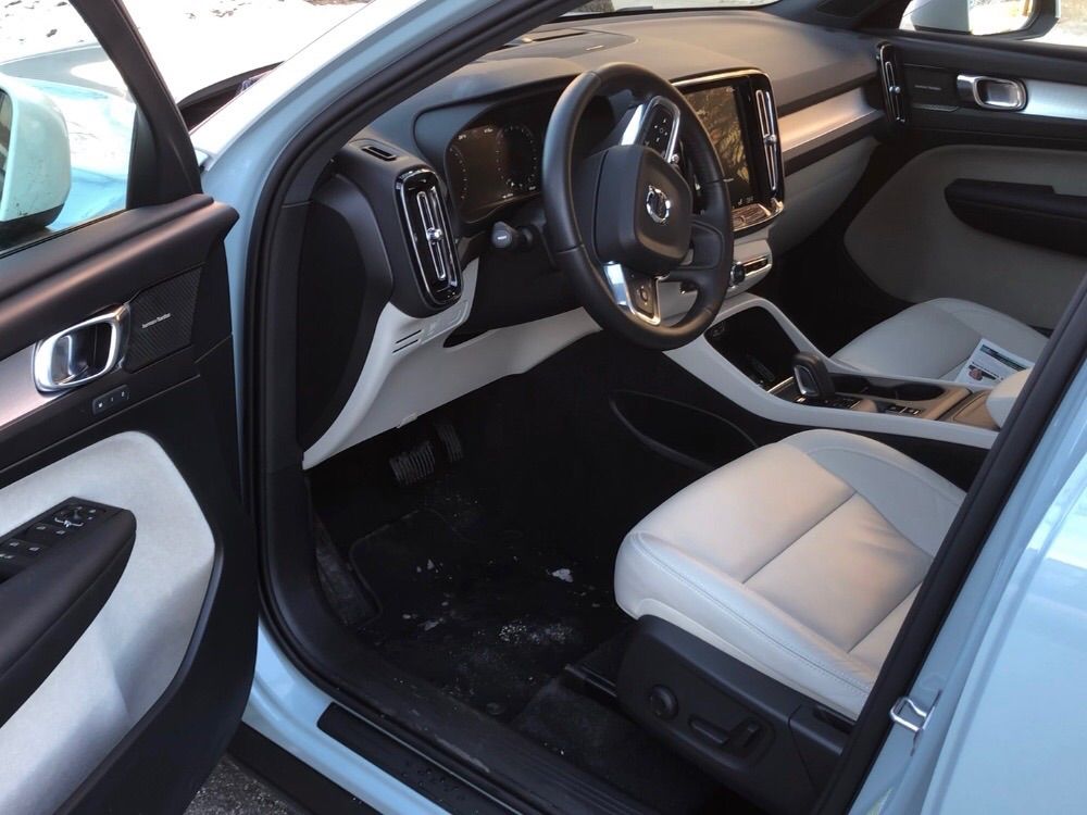 The interior driver's side of the Volvo XC40 AWD Momentum.