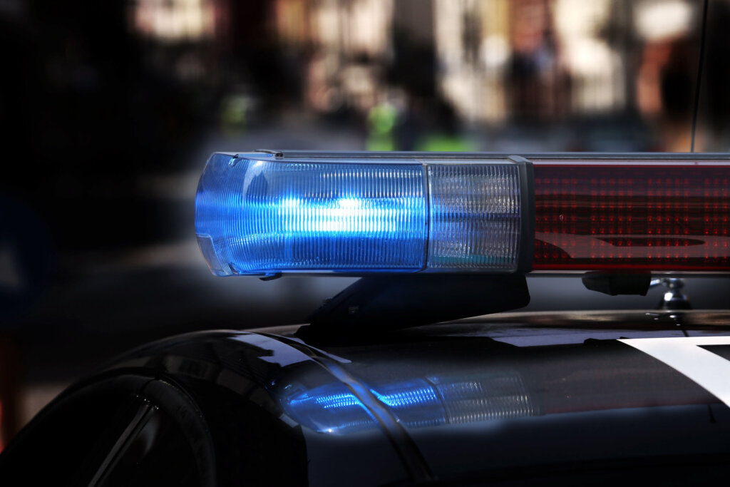 Blue flashing sirens of police car