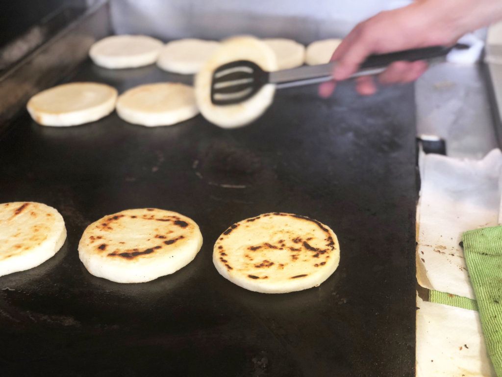 Arepas on the grill inside the Arepa Zone food truck in Northwest D.C.