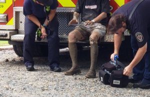 Man stuck in mud