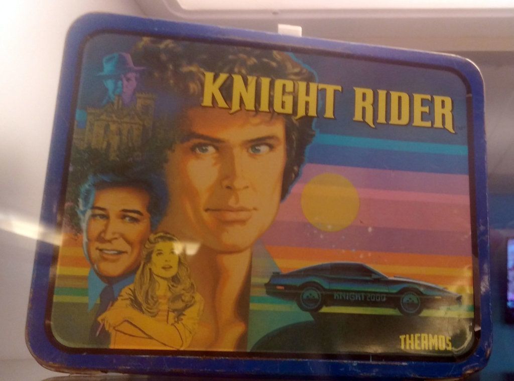 A lunchbox featuring characters of the TV show "Knight Rider."
