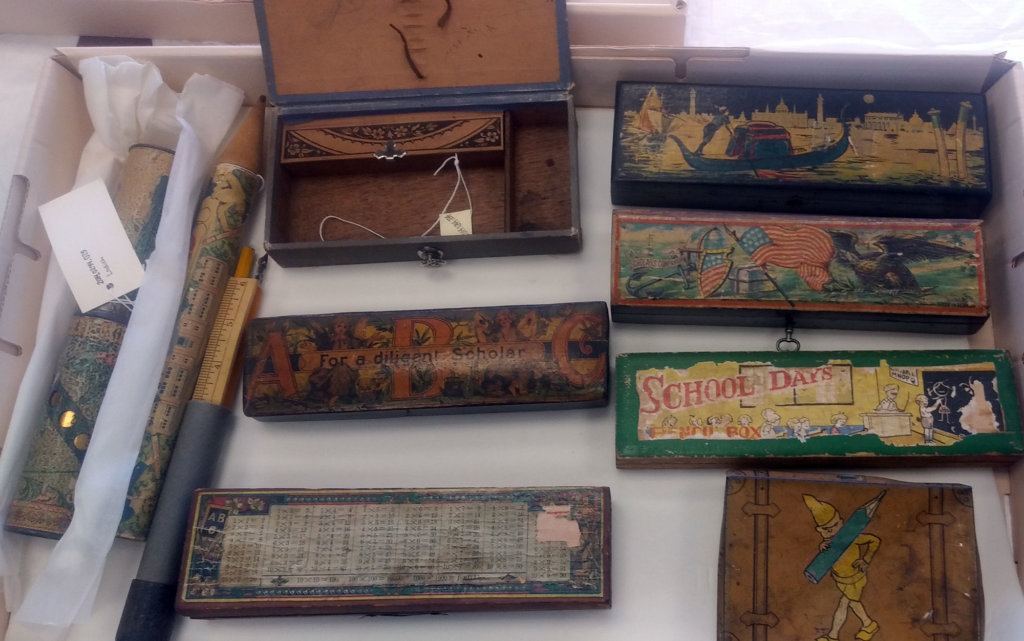 School supplies often reflected the time period. The pencil box with the American flag and the eagle is from the Americanization period that started in the 1880s, during the beginning of a large immigration wave, curator for the National Museum of American History's Division of Cultural and Community Life Debbie Schaefer-Jacobs said. During this time, there were a lot of immigrants coming in from Mediterranean countries and from Russia, Lithuania and Poland. Some of these immigrants wanted to retain some of their ethnic traditions so that would be why sometimes school supplies would have scenes from their old country, like the pencil case on the top right with a Venetian scene, she said.