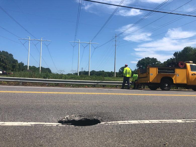 <em>Crews are working to repair a sinkhole that opened up on Md. 214 in Anne Arundel County.</em>