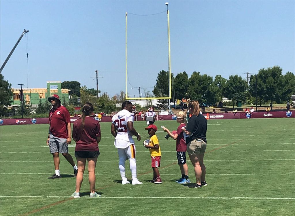 Chris Thompson signs autographs Thursday in Richmond.