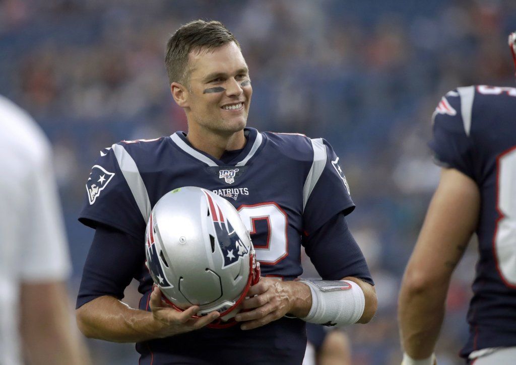 New England Patriots quarterback Tom Brady warms up before an NFL preseason football game against the Carolina Panthers, Thursday, Aug. 22, 2019, in Foxborough, Mass.
