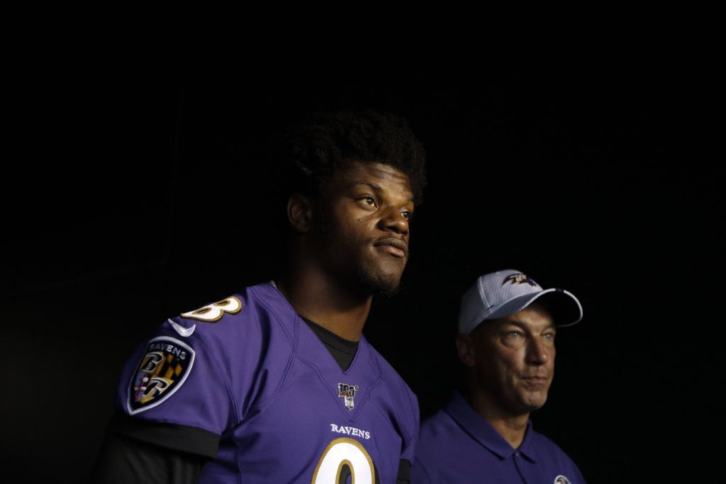Baltimore Ravens' Lamar Jackson walks onto the field before a preseason NFL football game against the Philadelphia Eagles, Thursday, Aug. 22, 2019, in Philadelphia.