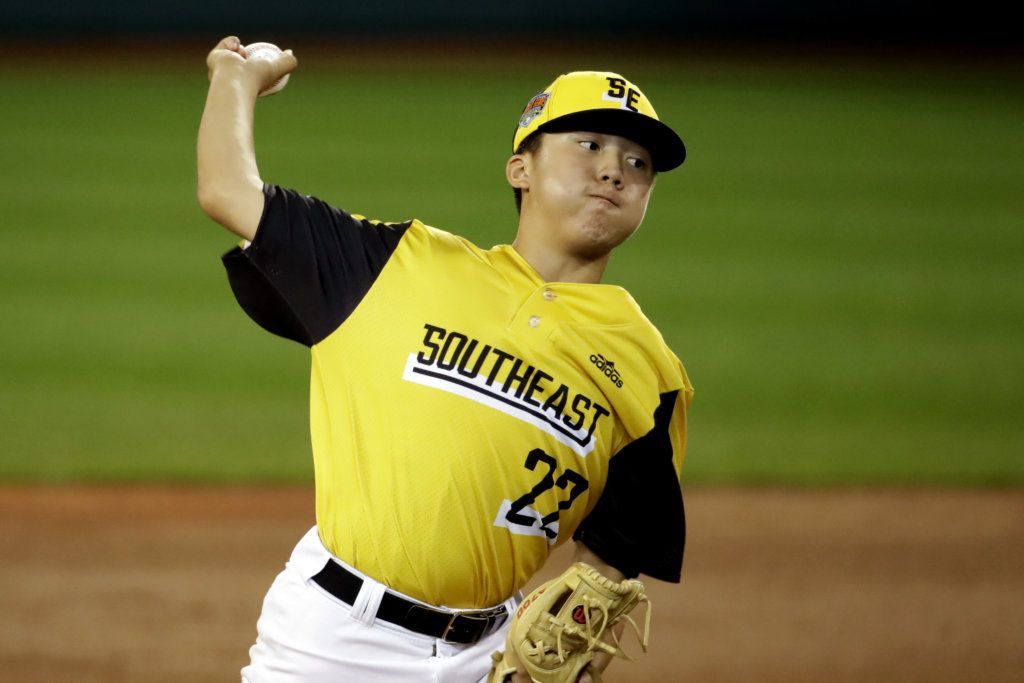 South Riding, Va.'s Justin Lee delivers during the first inning of the team's baseball game against River Ridge, La., at the Little League World Series in South Williamsport, Pa., Thursday, Aug. 22, 2019.