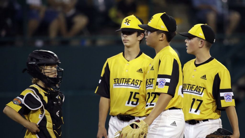 South Riding, Virginia's catcher Noah Culpepper, Brady Yates (15), pitcher Justin Lee (22) and Chase Obstgarten (17) meet on the pitchers mound against River Ridge, Louisiana during the first inning of a baseball game at the Little League World Series tournament in South Williamsport, Pa., Thursday, Aug. 22, 2019. River Ridge, Louisiana won the game 10-0.
