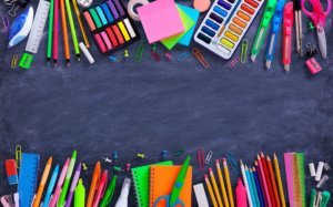 School And Office Supplies On Blackboard